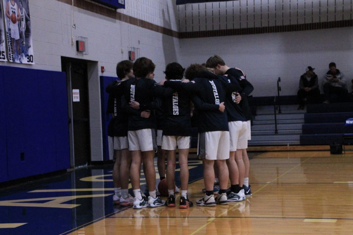 The team huddles before a game against Millersburg Area SD on Dec. 19.