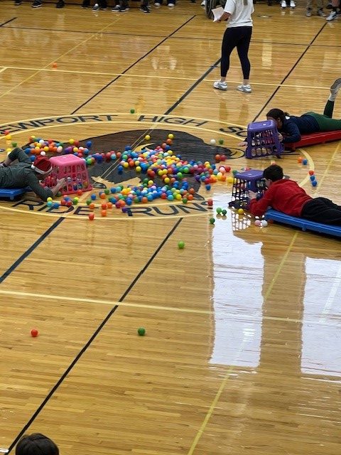 Students played in a life-sized Hungry Hungry Hippos game at the winter pep rally.