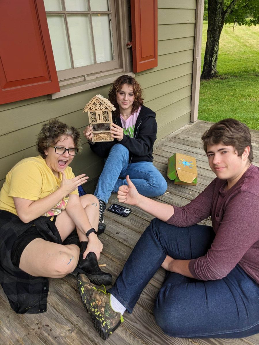 Freshman from left: Harlow Huff, Madyson Keefer and Robert Regester work on bug hotels at Little Buffalo. 