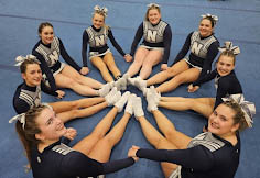 The team poses while waiting for the competition results on Nov. 13.