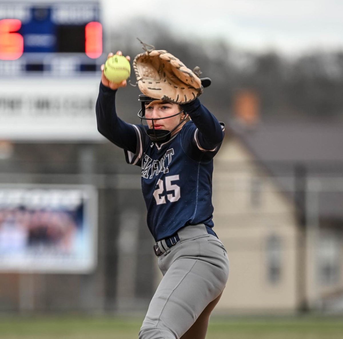 Senior pitcher Megan Foltz winds up.