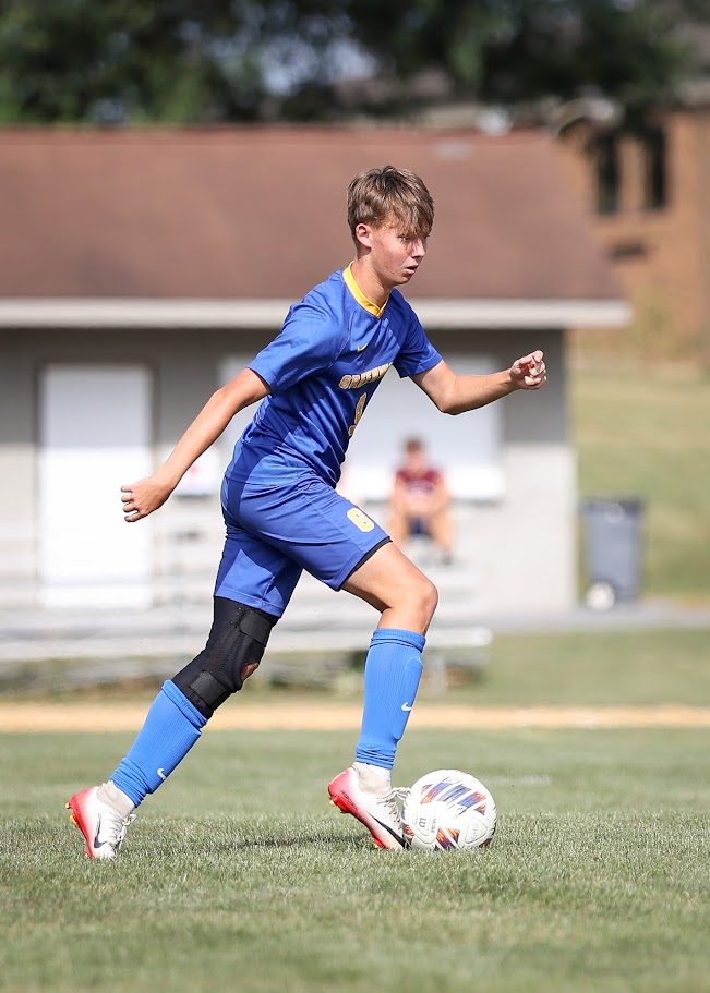 Junior Camden Barrick dribbles the ball in a scrimmage against Fannett-Metal earlier this season.
