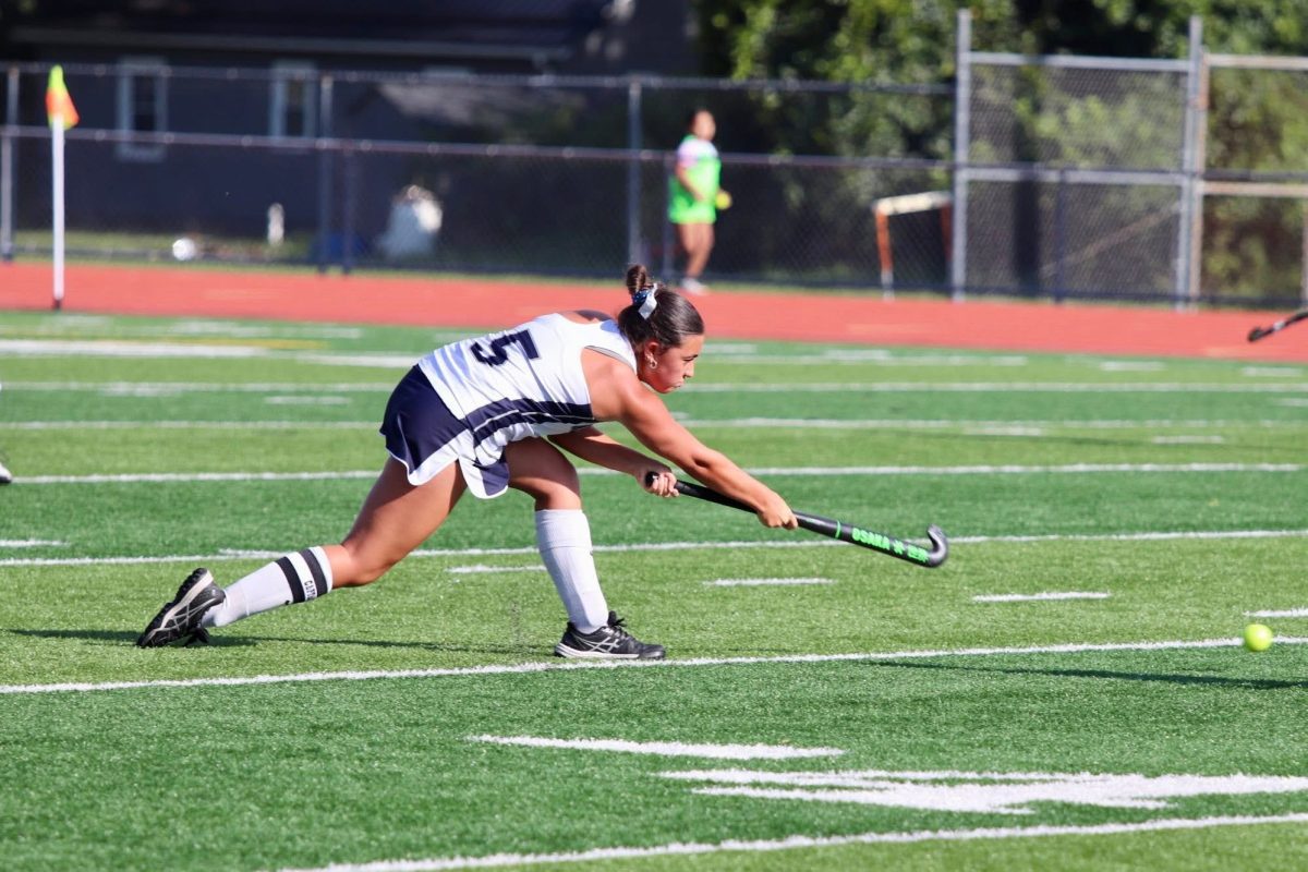 Junior Emma Whisler passes the ball during the PeCo game against Susquenita.