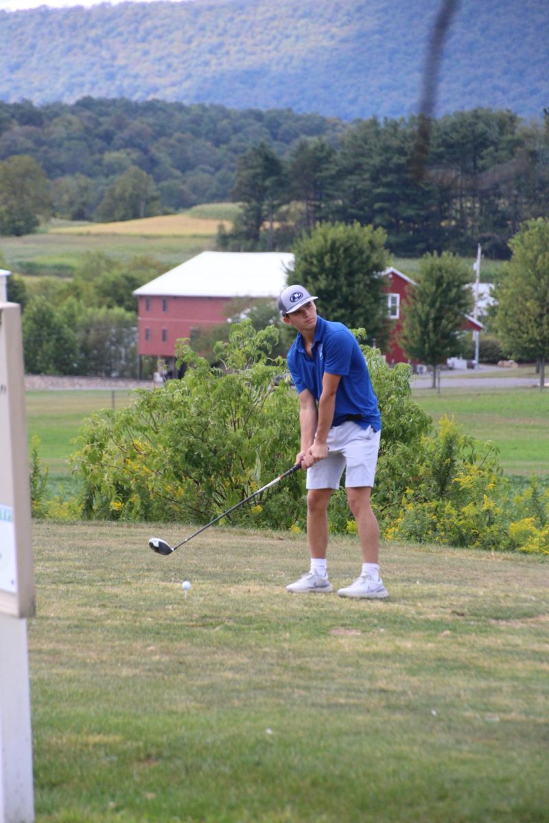 Junior Tai Caudle stares down the fairway towards where he'd like to hit.