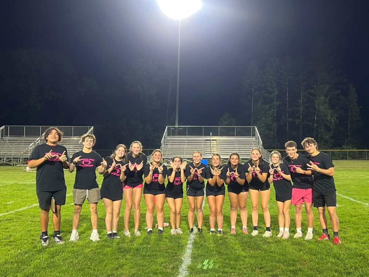 The juniors pose after their powderpuff win.